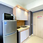 Tranquil Designed 2Br At Meikarta Apartment By Travelio